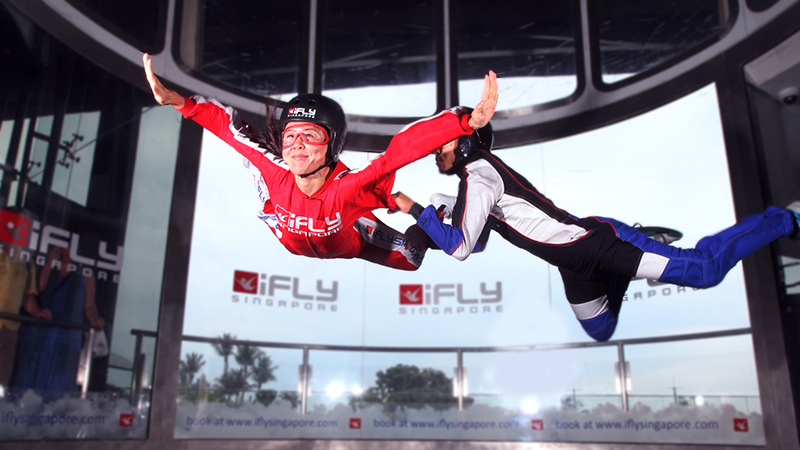 A person in the wind tunnel at iFly Singapore, which simulates an outdoor skydive